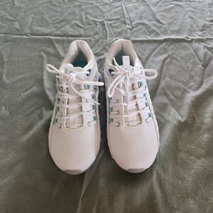 Fila White and Blue Athletic Shoes with Minimalist Design